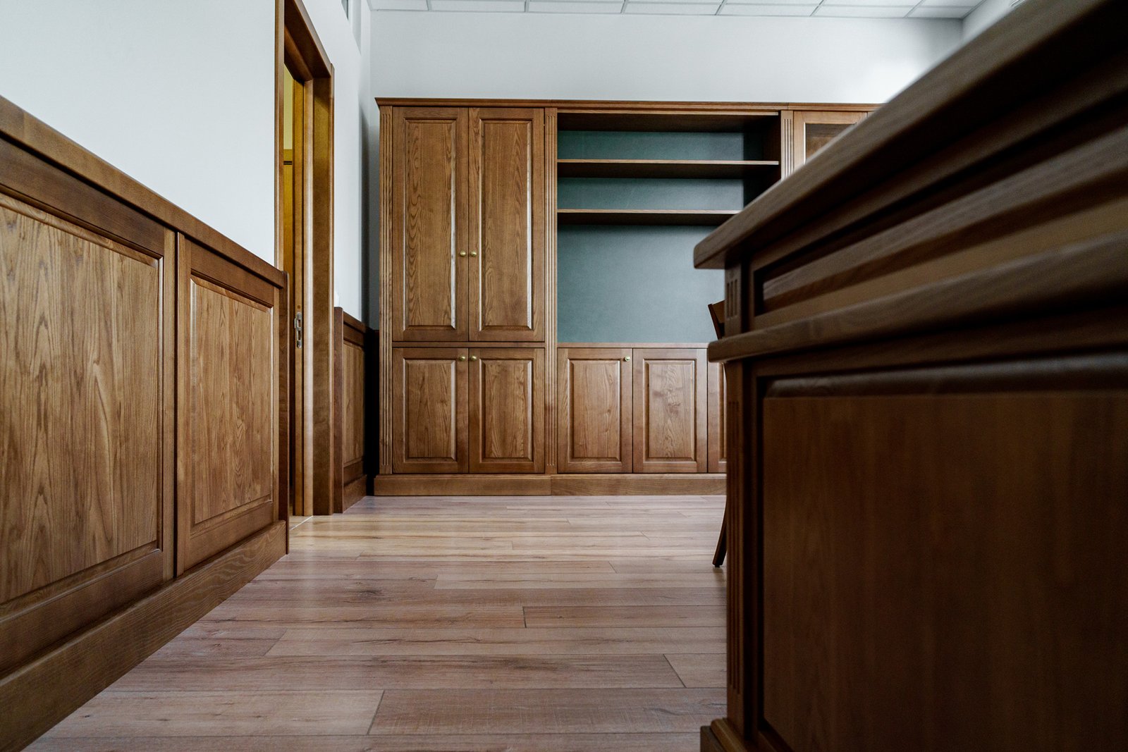 empty-wooden-bookshelf-in-luxury-private-office-2023-11-27-05-24-54-utc